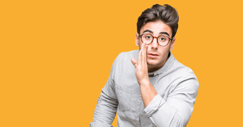 man telling secret