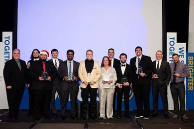 2025 award recipients take the stage at the Vertech Christmas party.