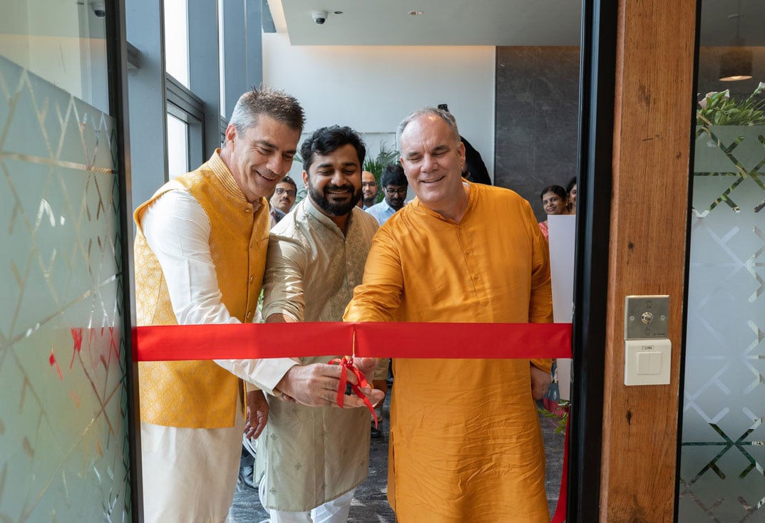Pune office ribbon cutting with Titus Crabb, Sudeep Somwanshi, Bob Morris.