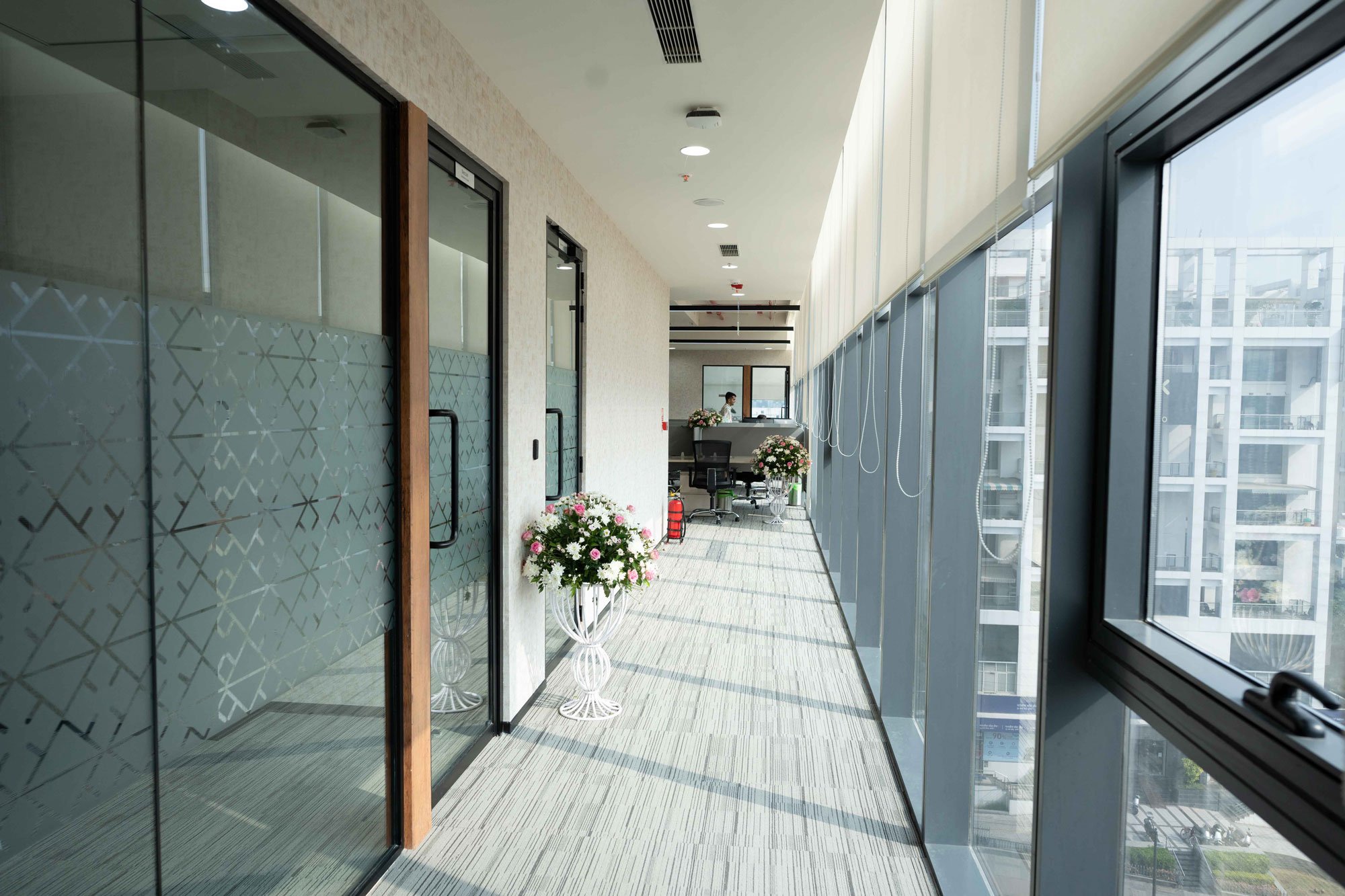 A windowed corridor at Vertech - India.