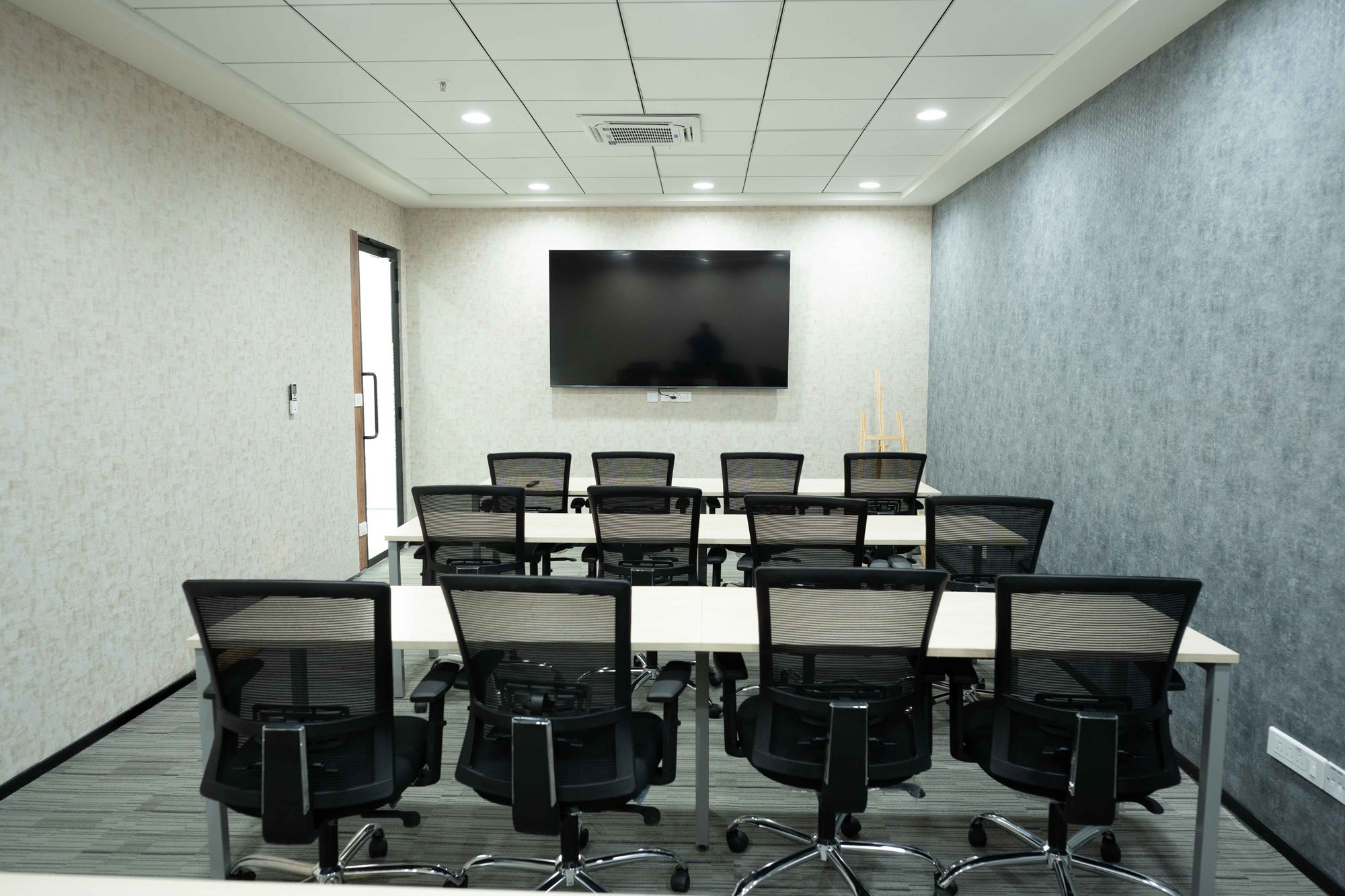 A conference/presentation room at the Pune office.