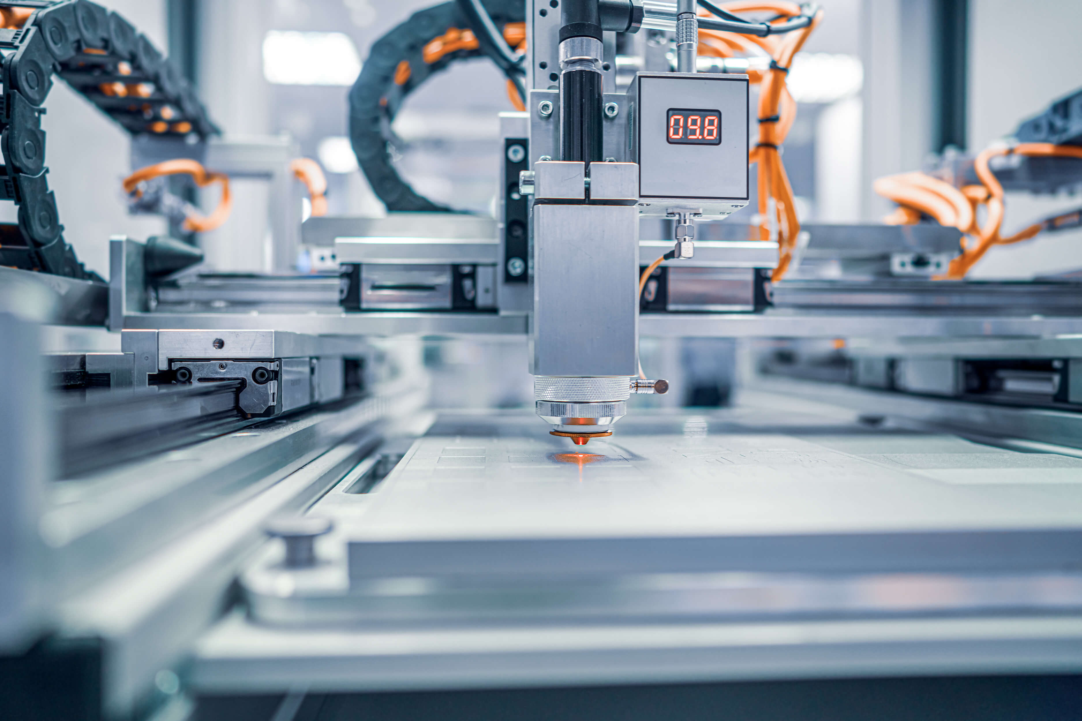 A CNC machine operating in a manufacturing setting.