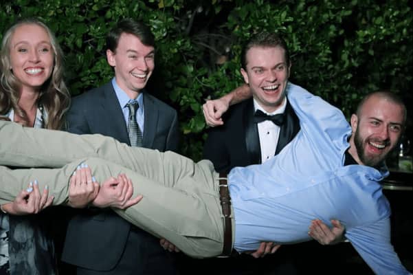 Team members playfully pose at the 2023 Vertech Christmas Party.