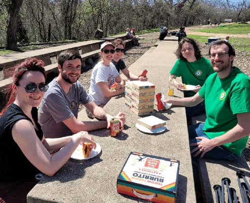 Enjoying a picnic and games.