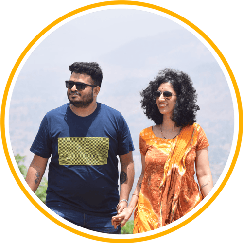 Smiling man and woman holding hands and walking