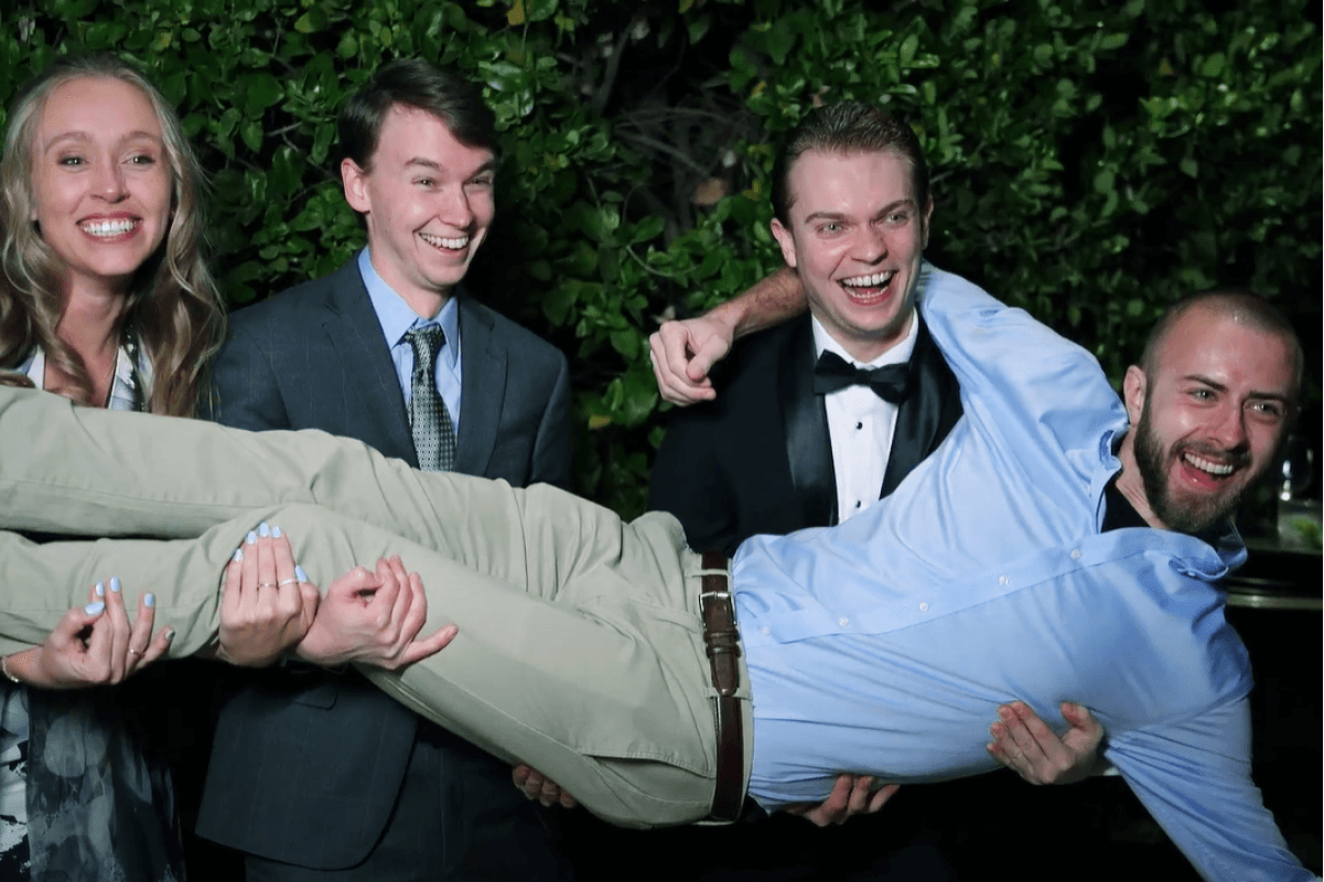Team members playfully pose at the 2023 Vertech Christmas Party.